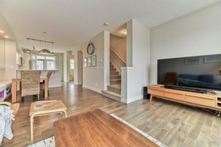 Photo 9: 571 Sherwood Boulevard NW in Calgary: Sherwood Row/Townhouse for sale : MLS®# A1182579