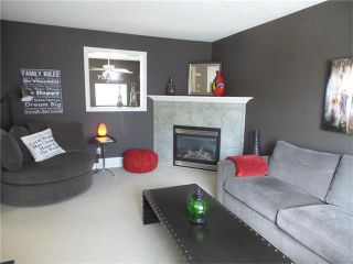 Photo 2: 97 CRYSTAL SHORES Cove: Okotoks House for sale : MLS®# C4113551