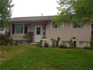 Photo 1: 707 58 Street SE in Calgary: Penbrooke Residential Detached Single Family for sale : MLS®# C3631943