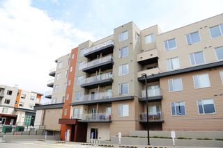 Photo 1: 313 71 Shawnee Common SW in Calgary: Shawnee Slopes Apartment for sale : MLS®# A1221739