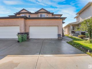 Photo 1: 8041 166A Avenue in Edmonton: Zone 28 House Half Duplex for sale : MLS®# E4357601