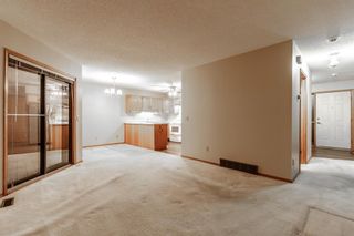 Photo 9: 10 Sandarac Circle NW in Calgary: Sandstone Valley Row/Townhouse for sale : MLS®# A1174532