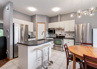 Photo 12: 117 Hamptons Link NW in Calgary: Hamptons Row/Townhouse for sale : MLS®# A1235118