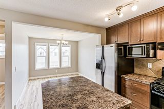 Photo 12: 20 Eversyde Park SW in Calgary: Evergreen Row/Townhouse for sale : MLS®# A1213117