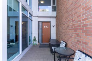 Photo 5: 582 Riverfront Lane SE in Calgary: Downtown East Village Row/Townhouse for sale : MLS®# A2019285