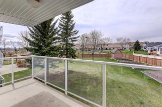 Photo 17: 206 309 Woodside Drive NW: Airdrie Apartment for sale : MLS®# A1218082