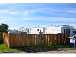 Main Photo: 48 8420 N ALASKA Road in Fort St. John: Fort St. John - City SE Manufactured Home for sale in "PEACE COUNTRY MHP" (Fort St. John (Zone 60))  : MLS®# N230672