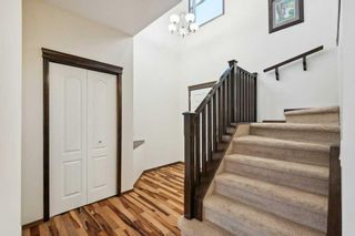 Photo 10: 306 Autumn Circle SE in Calgary: Auburn Bay Detached for sale : MLS®# A2097084