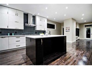 Photo 4: 2422 Bowness Road NW in CALGARY: West Hillhurst Residential Attached for sale (Calgary)  : MLS®# C3545963