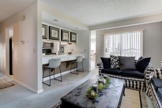 Photo 9: 7 Coach Manor Rise SW in Calgary: Coach Hill Detached for sale : MLS®# A2049271