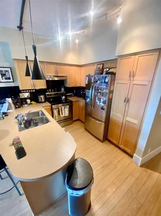 Photo 2: 812 205 Riverfront Avenue SW in Calgary: Chinatown Apartment for sale : MLS®# A2125105