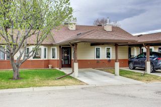Photo 1: 2623 Dovely Court SE in Calgary: Dover Row/Townhouse for sale : MLS®# A1213020