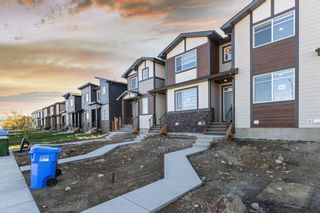 Photo 2: 167 Wolf Creek Avenue SE in Calgary: C-281 Row/Townhouse for sale : MLS®# A2006523