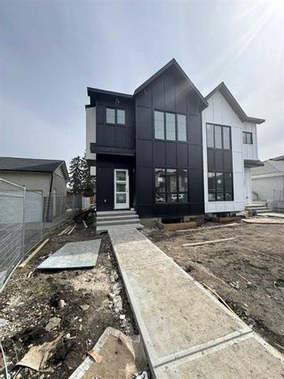 Main Photo: 1418 41 Street SW in Calgary: Rosscarrock Semi Detached (Half Duplex) for sale : MLS®# A2121773