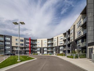 Photo 2: 221 8530 8A Avenue SW in Calgary: West Springs Apartment for sale : MLS®# A1245709