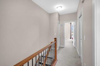 Photo 27: 14 169 Rockyledge View NW in Calgary: Rocky Ridge Row/Townhouse for sale : MLS®# A2093435