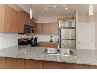 Photo 9: 322 9655 KING GEORGE Boulevard in Surrey: Whalley Condo for sale in "GRUV" (North Surrey)  : MLS®# R2134761