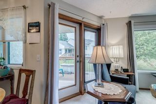 Photo 6: 71 Sandarac Circle NW in Calgary: Sandstone Valley Row/Townhouse for sale : MLS®# A1141051