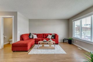 Photo 2: 127 Fireside Parkway: Cochrane Row/Townhouse for sale : MLS®# A1212822