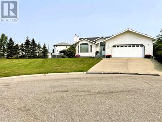 Photo 1: 11312 111 Avenue Close in Fairview: House for sale : MLS®# A2098267