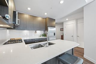 Photo 8: 302 88 9 Street NE in Calgary: Bridgeland/Riverside Apartment for sale : MLS®# A1212202