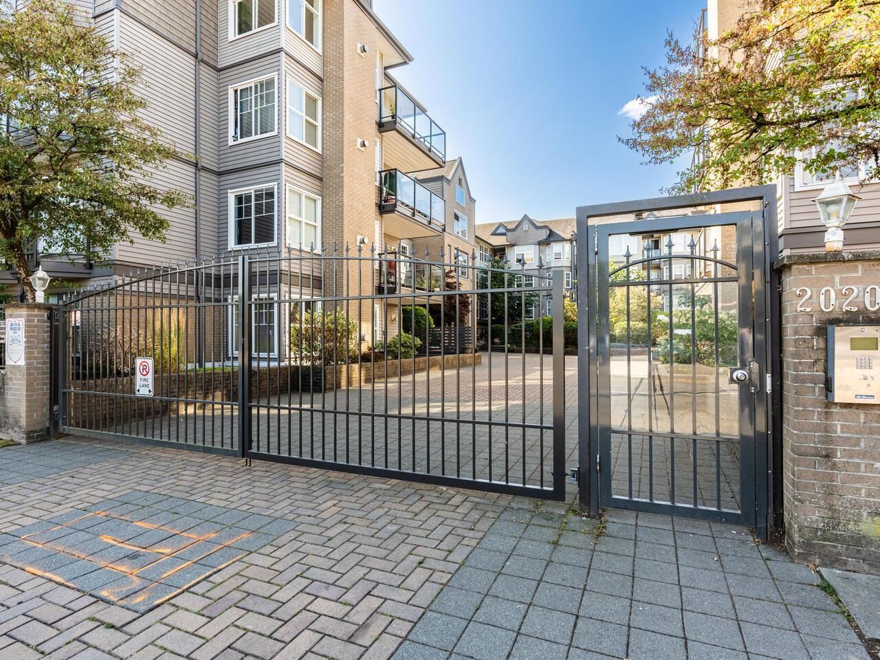 Main Photo: 222 20200 56 Avenue in Langley: Langley City Condo for sale in "The Bentley" : MLS®# R2717523