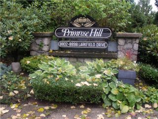 Photo 1: 8826 LARKFIELD Drive in Burnaby: Forest Hills BN Townhouse for sale in "PRIMROSE HILL" (Burnaby North)  : MLS®# V1028812