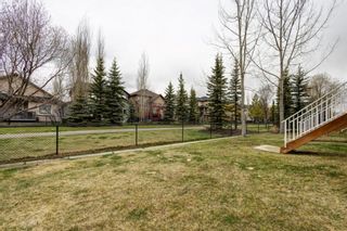 Photo 25: 10 Crystal Shores Cove: Okotoks Row/Townhouse for sale : MLS®# A1217849