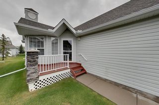 Photo 2: 38 1008 Woodside Way NW: Airdrie Row/Townhouse for sale : MLS®# A1123458