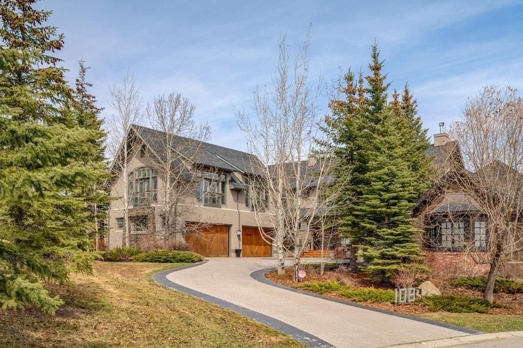 Dramatic curb appeal and everything you would expect from this stunning, Luxury custom home in coveted Elbow Valley