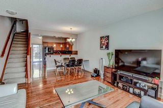 Photo 3: 4 156 Rockyledge View NW in Calgary: Rocky Ridge Row/Townhouse for sale : MLS®# A2120202