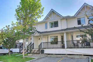 Photo 2: 403 950 Arbour Lake Road NW in Calgary: Arbour Lake Row/Townhouse for sale
