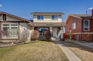 Photo 1: 3407 Cedarille Drive SW in Calgary: Cedarbrae Semi Detached (Half Duplex) for sale : MLS®# A2125470