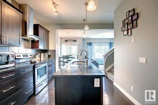 Photo 12: 7042 174 Avenue in Edmonton: Zone 28 House Half Duplex for sale : MLS®# E4304424