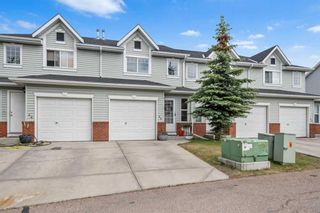 Photo 1: 22 Covemeadow Manor NE in Calgary: Coventry Hills Row/Townhouse for sale : MLS®# A2055904