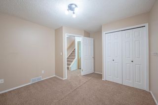 Photo 22: 36 Arbour Grove Close NW in Calgary: Arbour Lake Semi Detached for sale : MLS®# A1241960