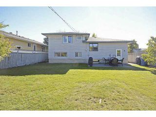 Photo 2: 1404 LAKE MICHIGAN Crescent SE in CALGARY: Lk Bonavista Downs Residential Detached Single Family for sale (Calgary)  : MLS®# C3635964