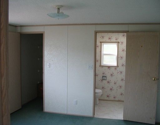 Photo 5: Photos: 18 5701 AIRPORT Drive in Fort Nelson: Fort Nelson -Town Manufactured Home for sale in "SOUTHRIDGE" (Fort Nelson (Zone 64))  : MLS®# N198426