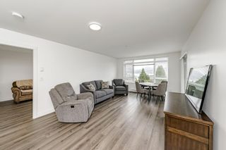 Photo 11: 411 2525 CLARKE Street in Port Moody: Port Moody Centre Condo for sale in "THE STRAND" : MLS®# R2780089