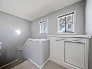 Photo 36: 123 Toscana Gardens NW in Calgary: Tuscany Row/Townhouse for sale : MLS®# A1217393