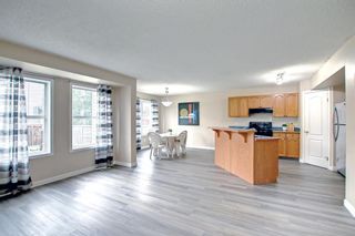 Photo 9: 104 Panamount Heights NW in Calgary: Panorama Hills Detached for sale : MLS®# A2004311