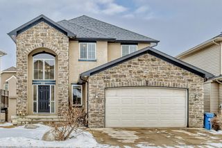 Photo 1: 66 COUGARSTONE Crescent SW in Calgary: Cougar Ridge Detached for sale : MLS®# A2020530