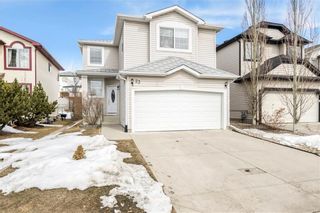 Photo 1: 23 TUSCARORA WY NW in Calgary: Tuscany House for sale : MLS®# C4174470