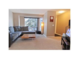 Photo 2: 137 123 QUEENSLAND Drive SE in CALGARY: Queensland Townhouse for sale (Calgary)  : MLS®# C3553319