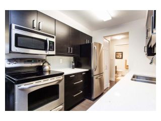 Photo 5: 102 2299 E 30TH Avenue in Vancouver: Collingwood VE Condo for sale in "TWIN COURT" (Vancouver East)  : MLS®# V1010933