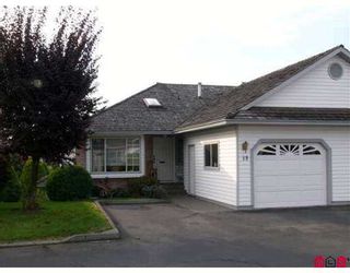 Photo 1: 33922 KING Road in Abbotsford: Poplar Townhouse for sale in "Kingsview Estates" : MLS®# F2622714