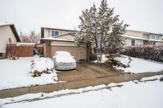 Photo 1: 119 Woodside Circle SW in Calgary: Woodlands Detached for sale : MLS®# A2121331