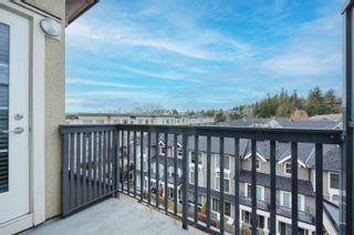 Photo 1: A505 20487 65 Avenue in Langley: Willoughby Heights Condo for sale in "TOWNSHIP COMMONS" : MLS®# R2863088