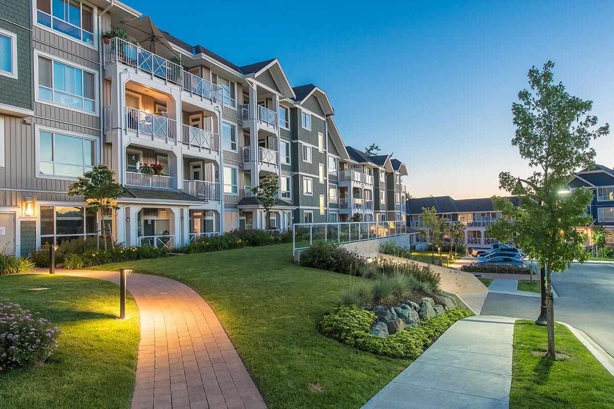 Main Photo: 112 16398 64 Avenue in Surrey: Cloverdale BC Condo for sale in "THE RIDGE AT BOSE FARMS" (Cloverdale)  : MLS®# R2590221