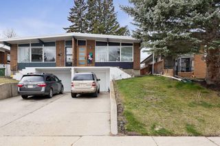 Photo 1: 41A Rosetree Road NW in Calgary: Rosemont Semi Detached (Half Duplex) for sale : MLS®# A2128935